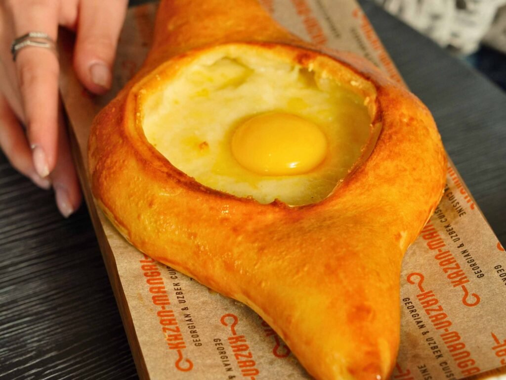 Boat-shaped Adjaruli Khachapuri from Georgian cuisine
